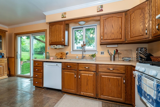 3624 Terhune Rd, Ann Arbor, MI 48104 - kitchen featuring white appliances, a sink, brown cabinetry, light countertops, and ornamental molding