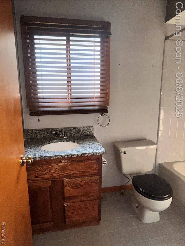 1379 Walter S Hall Dr, Lake Orion, MI 48362 - full bath with vanity, toilet, healthy amount of natural light, and baseboards