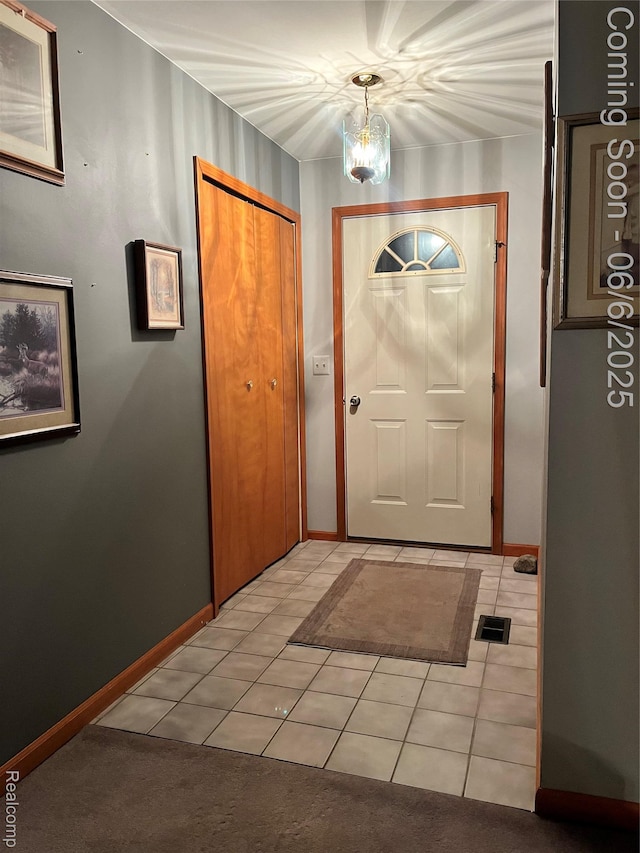 1379 Walter S Hall Dr, Lake Orion, MI 48362 - entrance foyer with light tile patterned floors and baseboards