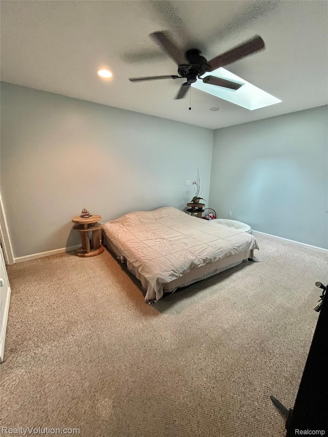 25850 Eureka Dr, Warren, MI 48091 - bedroom with a skylight, carpet floors, baseboards, recessed lighting, and ceiling fan