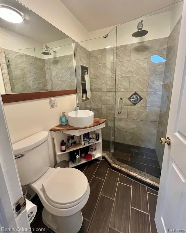 25850 Eureka Dr, Warren, MI 48091 - full bath with toilet, a shower stall, vanity, and wood finish floors
