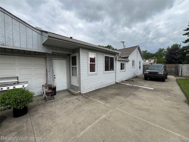 25850 Eureka Dr, Warren, MI 48091 - rear view of property with concrete driveway