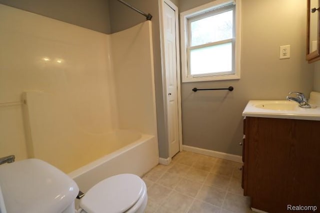 111 N Genesee St, Davison, MI 48423 - bathroom with toilet, vanity, bathtub / shower combination, and baseboards