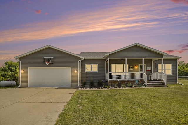 8862 Bever Rd, Delton, MI 49046 - ranch-style house with covered porch, a front yard, driveway, and a garage
