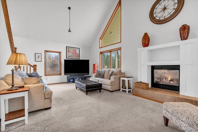 3206 Fish Lake Rd, Lapeer, MI 48446 - living area with high vaulted ceiling, a fireplace, and carpet flooring