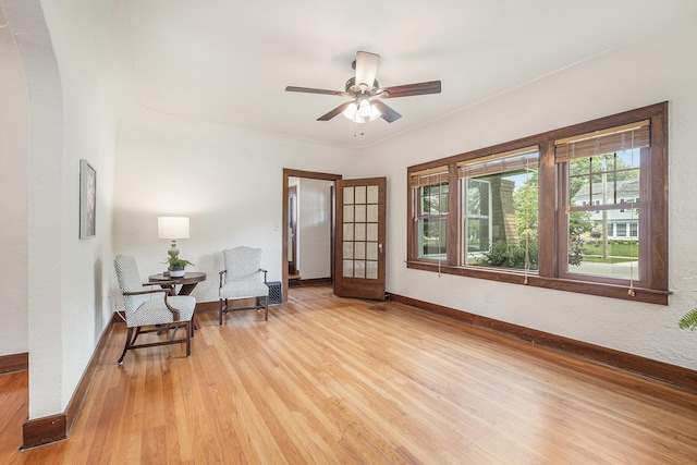 2323 Paris Ave SE, Grand Rapids, MI 49507 - sitting room featuring light wood finished floors, baseboards, and a ceiling fan