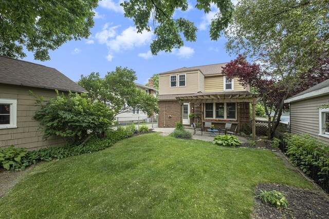 2323 Paris Ave SE, Grand Rapids, MI 49507 - back of house featuring a pergola and a patio