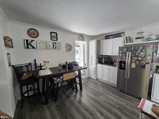 4101 S Sheridan Rd, Lennon, MI 48449 - dining room with a textured ceiling, dark wood-style floors, and crown molding