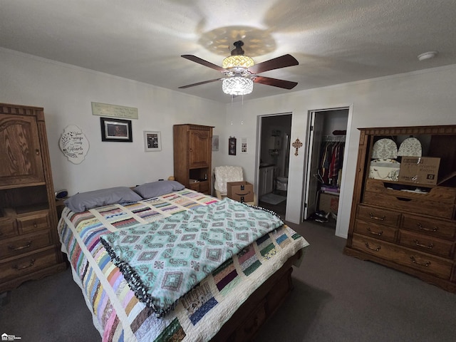 4101 S Sheridan Rd, Lennon, MI 48449 - bedroom featuring dark carpet, a closet, a walk in closet, and a ceiling fan
