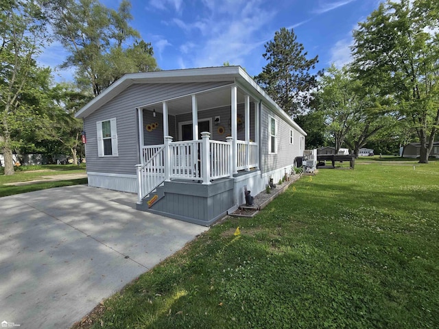 4101 S Sheridan Rd, Lennon, MI 48449 - manufactured / mobile home with a front yard