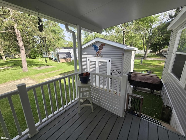4101 S Sheridan Rd, Lennon, MI 48449 - deck with a yard and an outdoor structure