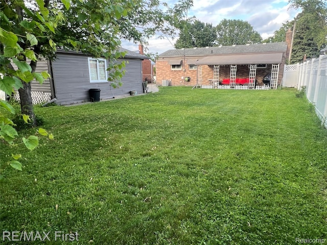 28447 Patricia Ave, Warren, MI 48092 - view of yard featuring a patio area and central AC
