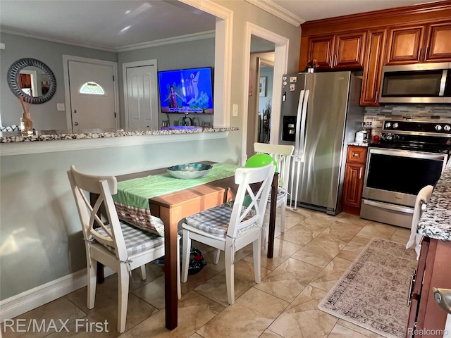 28447 Patricia Ave, Warren, MI 48092 - kitchen with stainless steel appliances, crown molding, brown cabinets, light stone countertops, and decorative backsplash