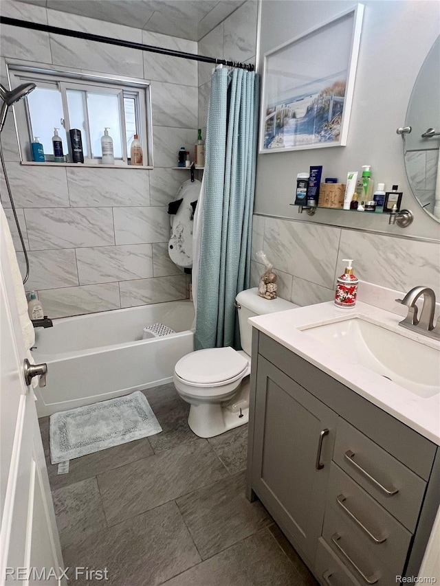 28447 Patricia Ave, Warren, MI 48092 - full bath featuring vanity, shower / bath combo, toilet, and tile walls