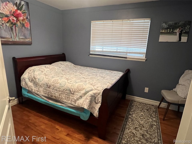 28447 Patricia Ave, Warren, MI 48092 - bedroom featuring wood finished floors and baseboards