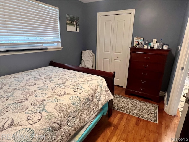 28447 Patricia Ave, Warren, MI 48092 - bedroom featuring a closet and wood finished floors