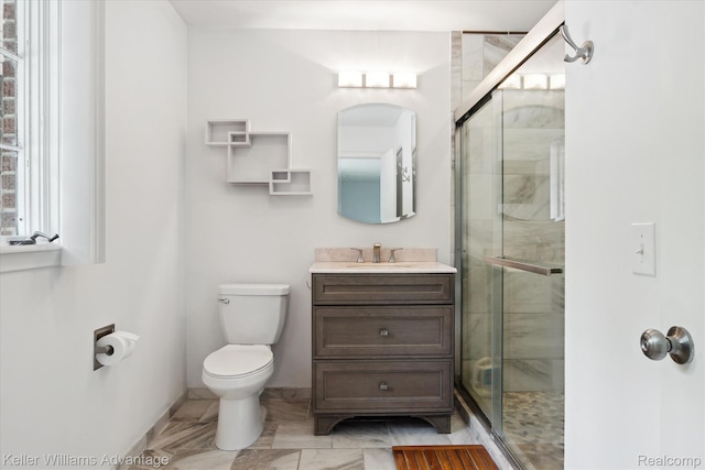 58540 Grand River Ave, New Hudson, MI 48165 - full bathroom featuring vanity, a shower stall, toilet, baseboards, and marble finish flooring