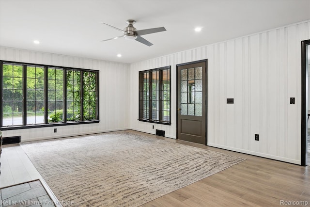 58540 Grand River Ave, New Hudson, MI 48165 - entryway with ceiling fan, wood finished floors, and recessed lighting