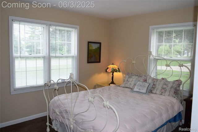7448 Miller Rd, Swartz Creek, MI 48473 - bedroom featuring baseboards and carpet