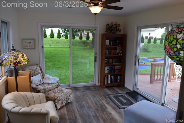7448 Miller Rd, Swartz Creek, MI 48473 - doorway with wood finished floors, healthy amount of natural light, and ceiling fan