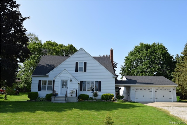 7448 Miller Rd, Swartz Creek, MI 48473 - view of front of property with a chimney, driveway, a front lawn, and a garage