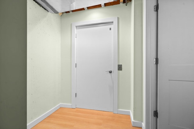 2928 Heeney Rd, Stockbridge, MI 49285 - hall with light wood-style floors and baseboards