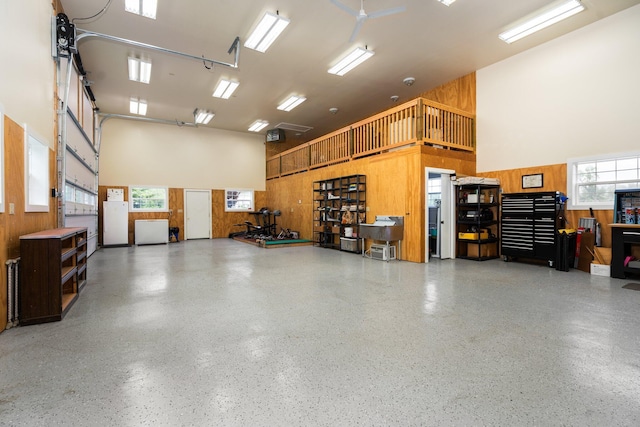 2928 Heeney Rd, Stockbridge, MI 49285 - garage with wood walls