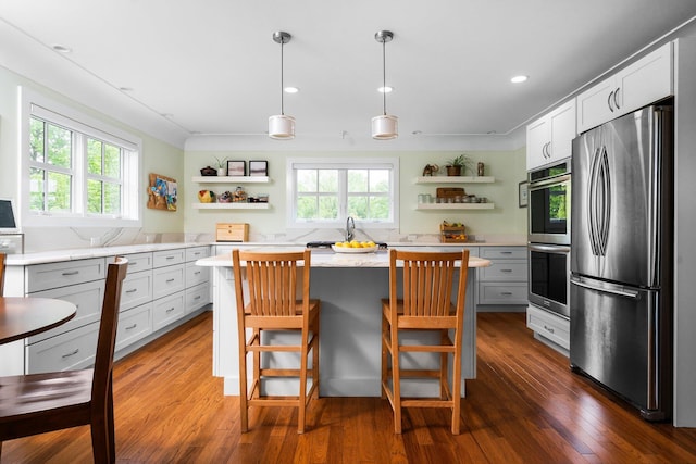 2928 Heeney Rd, Stockbridge, MI 49285 - kitchen featuring open shelves, stainless steel appliances, a center island, dark wood-style flooring, and recessed lighting