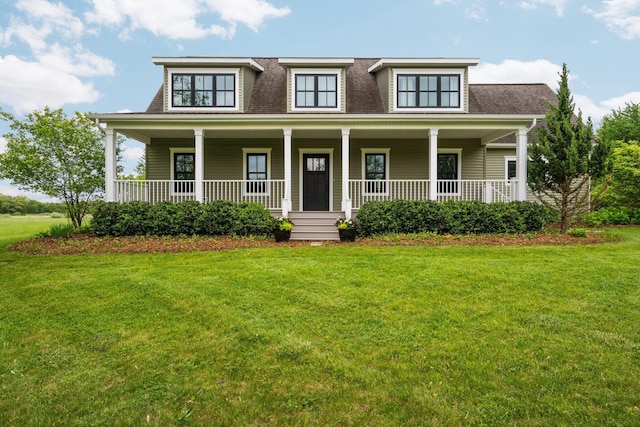 2928 Heeney Rd, Stockbridge, MI 49285 - view of front of home featuring a front yard, roof with shingles, and a porch