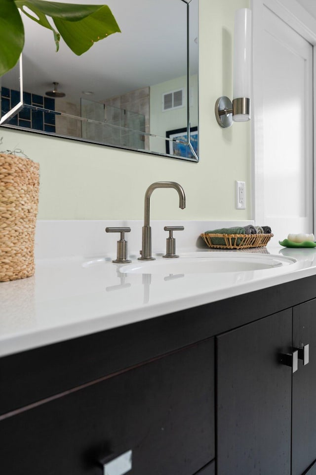 2928 Heeney Rd, Stockbridge, MI 49285 - bathroom featuring vanity and tiled shower