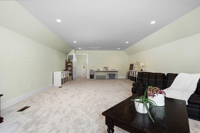 2928 Heeney Rd, Stockbridge, MI 49285 - living room with lofted ceiling, carpet floors, baseboards, and recessed lighting