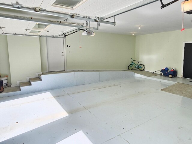 2928 Heeney Rd, Stockbridge, MI 49285 - garage with a garage door opener