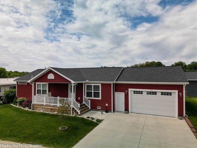 701 Knollcrest Ln, Fremont, MI 49412 - ranch-style house featuring concrete driveway, an attached garage, a porch, a front yard, and roof with shingles
