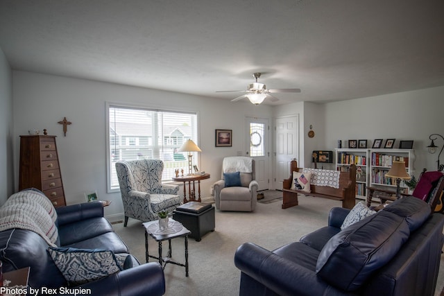 701 Knollcrest Ln, Fremont, MI 49412 - carpeted living room featuring a ceiling fan