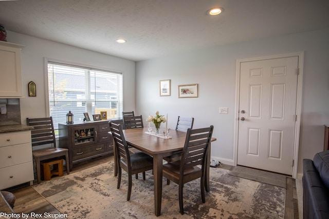 701 Knollcrest Ln, Fremont, MI 49412 - dining space featuring recessed lighting, wood finished floors, and baseboards