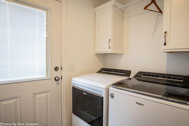701 Knollcrest Ln, Fremont, MI 49412 - washroom with cabinet space and washing machine and dryer