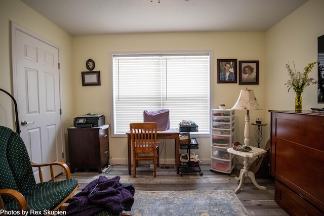 701 Knollcrest Ln, Fremont, MI 49412 - office area with wood finished floors and baseboards