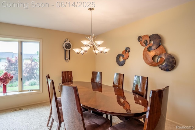 12950 Via Catherina Dr, Grand Blanc, MI 48439 - carpeted dining area featuring healthy amount of natural light and a chandelier