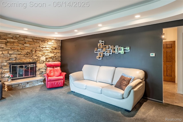 12950 Via Catherina Dr, Grand Blanc, MI 48439 - carpeted living area featuring recessed lighting and a stone fireplace