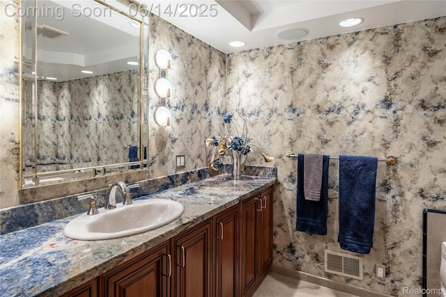 12950 Via Catherina Dr, Grand Blanc, MI 48439 - full bath with double vanity, recessed lighting, and wallpapered walls