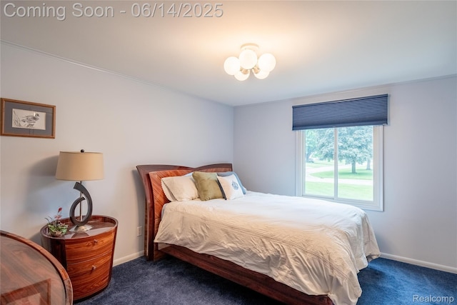 12950 Via Catherina Dr, Grand Blanc, MI 48439 - carpeted bedroom featuring baseboards and a chandelier