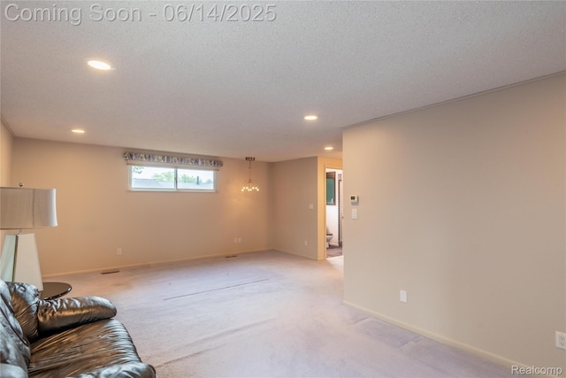 12950 Via Catherina Dr, Grand Blanc, MI 48439 - unfurnished living room with recessed lighting and light colored carpet