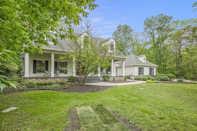 3113 Miller Rd, Ann Arbor, MI 48103 - new england style home with a porch and a front lawn