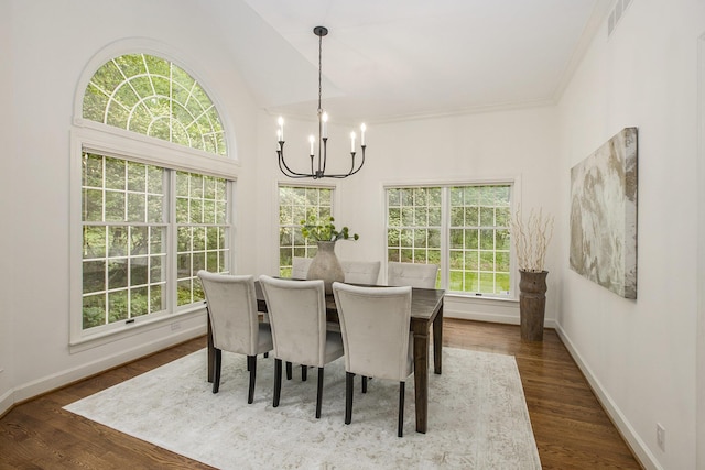 3113 Miller Rd, Ann Arbor, MI 48103 - dining room with a chandelier, baseboards, dark wood-style floors, and crown molding