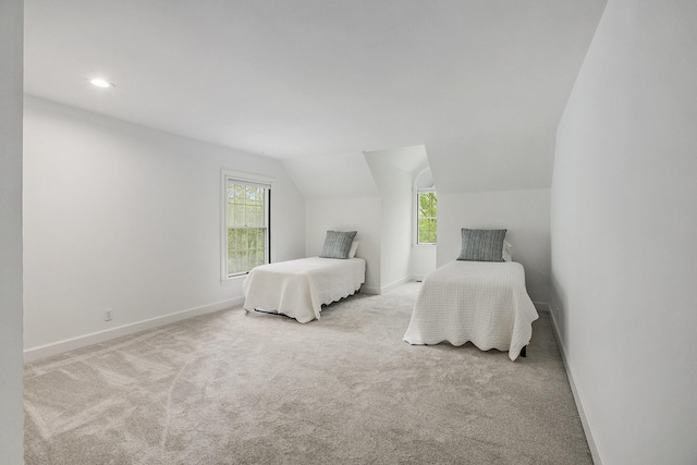 3113 Miller Rd, Ann Arbor, MI 48103 - bedroom with carpet flooring, baseboards, vaulted ceiling, and recessed lighting