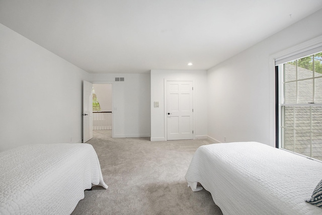 3113 Miller Rd, Ann Arbor, MI 48103 - bedroom featuring light colored carpet, recessed lighting, and baseboards