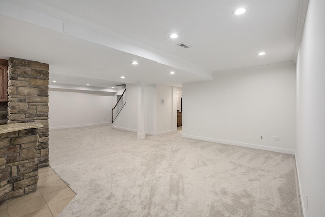 3113 Miller Rd, Ann Arbor, MI 48103 - finished basement featuring recessed lighting, light carpet, crown molding, light tile patterned flooring, and baseboards