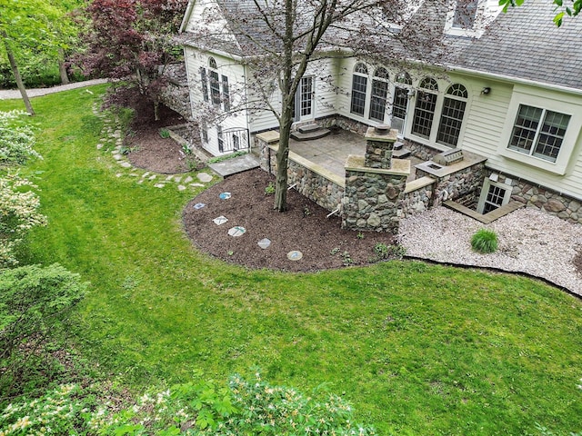 3113 Miller Rd, Ann Arbor, MI 48103 - view of grassy yard featuring a patio and french doors