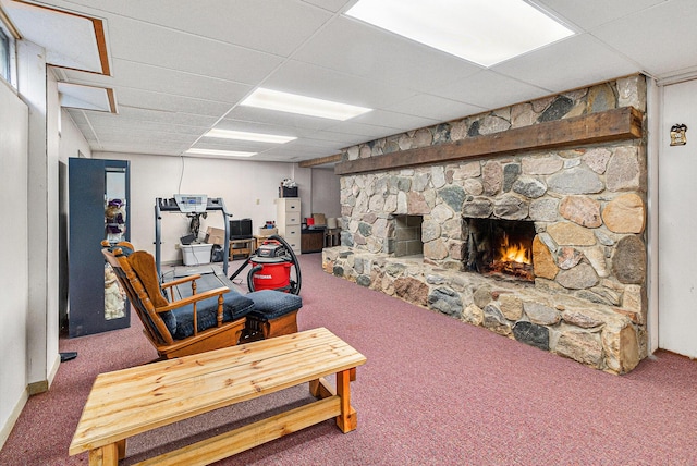 2639 Dutch Acres, Allegan, MI 49010 - carpeted living area with a stone fireplace and a drop ceiling