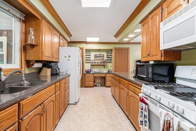 2639 Dutch Acres, Allegan, MI 49010 - kitchen featuring white appliances, a sink, ornamental molding, and brown cabinetry